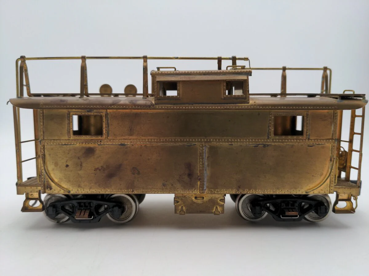 O Scale 2 Rail Brass Off Center Caboose (Undecorated)